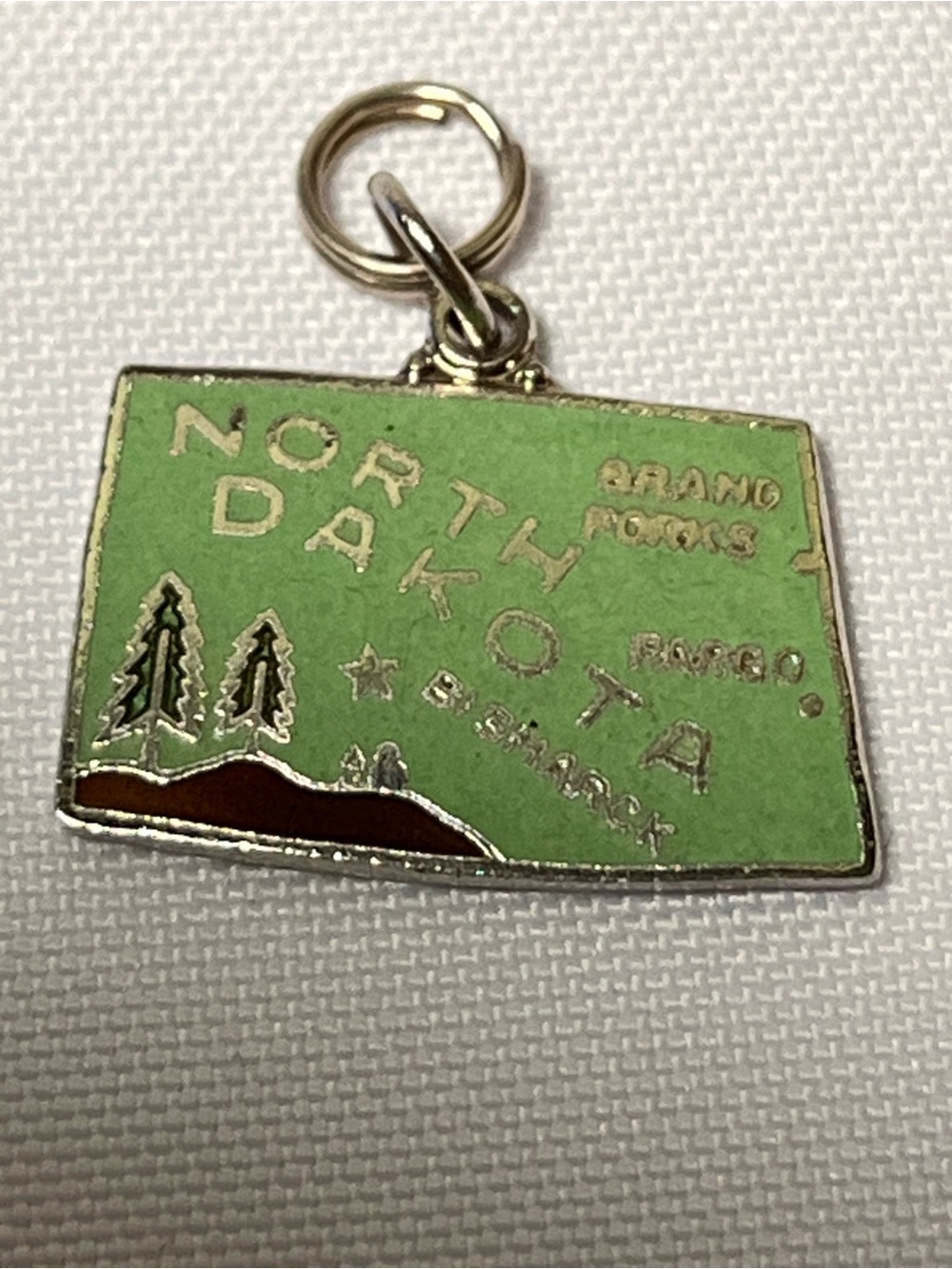 Vintage Green North Dakota Enamel Ornament Charm Pendant
Collectible